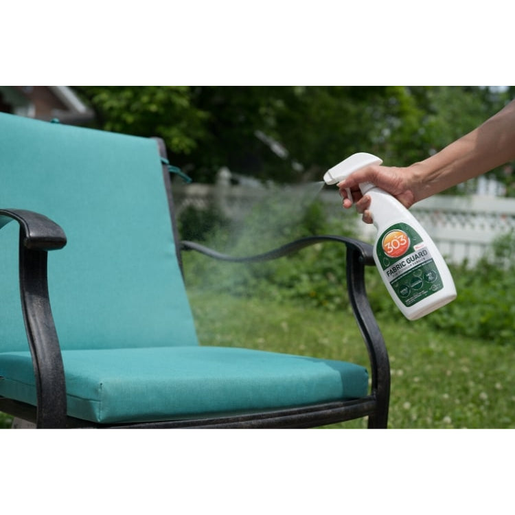 Spraying 303 Fabric Guard on patio chair