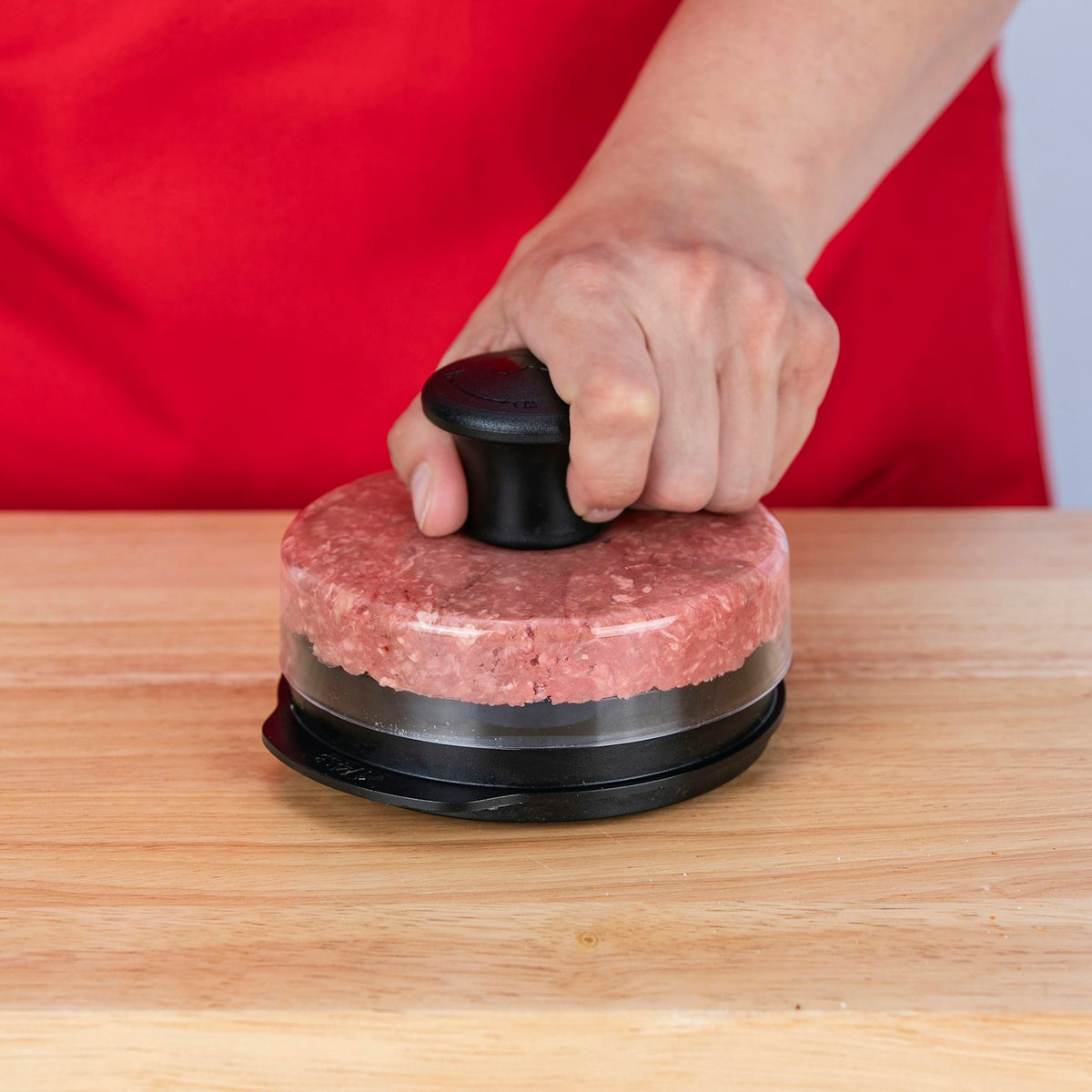 Weber Burger Press in use