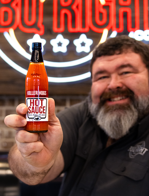 Malcom Reed with Killer Hogs Hot Sauce